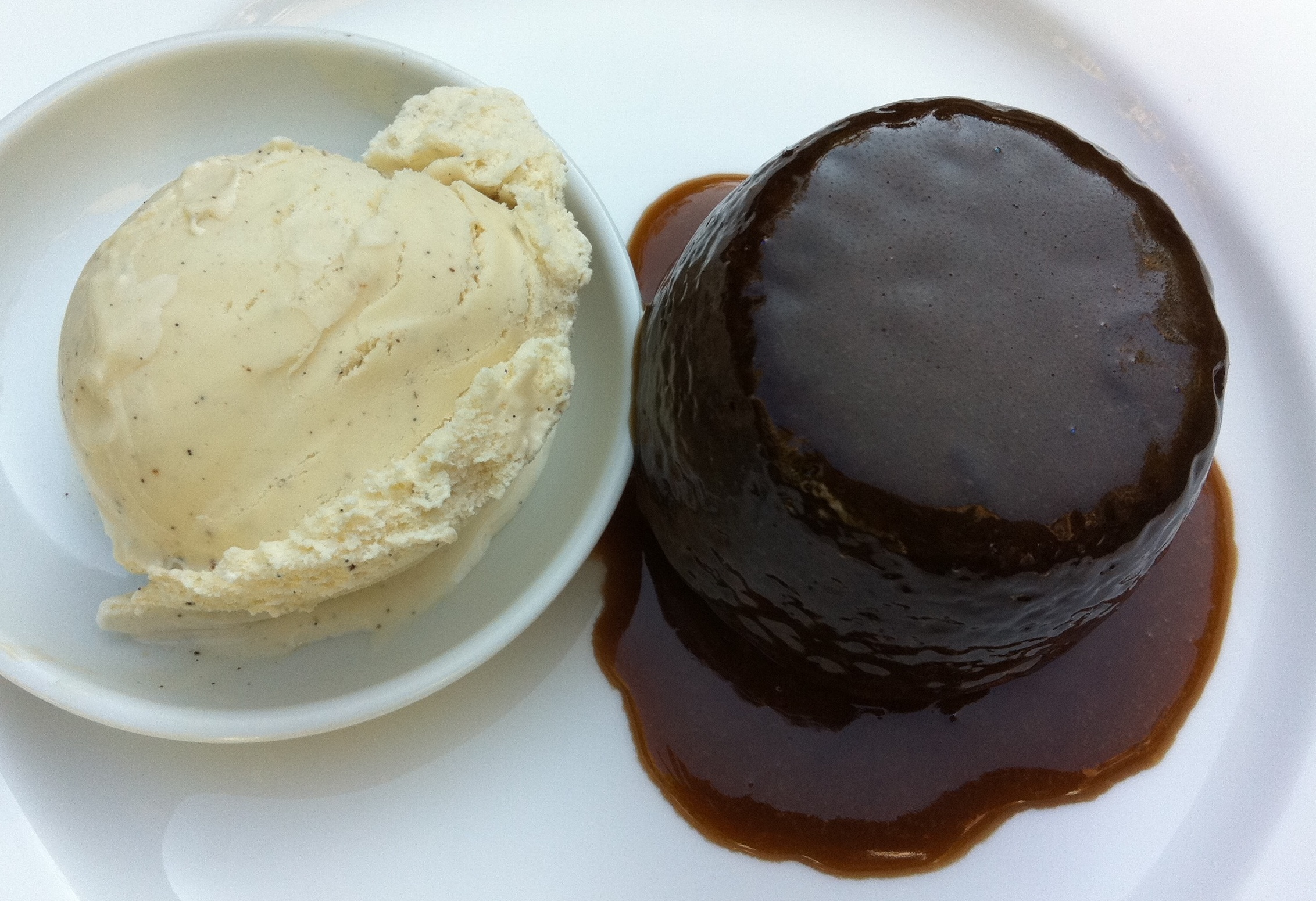 Individual sticky puddings with vanilla bean ice cream -